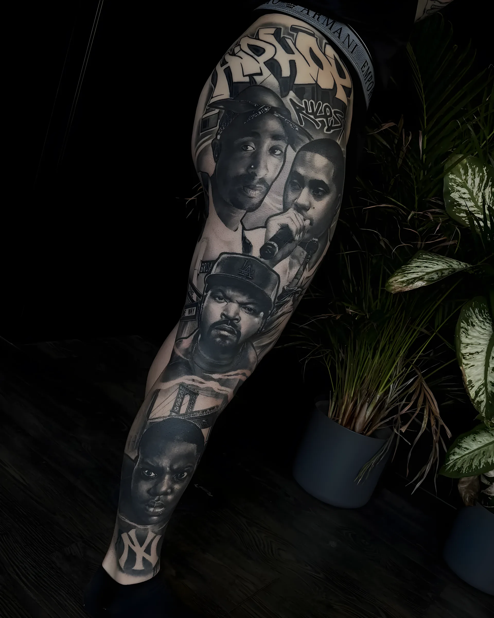 Legends full sleeve black and grey realism tattoo