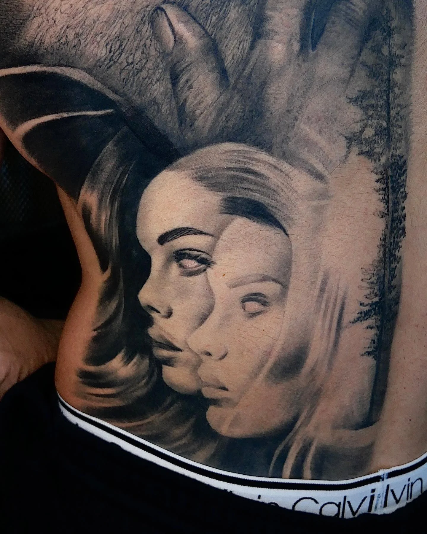 Black and grey back piece fully healed in natural light
