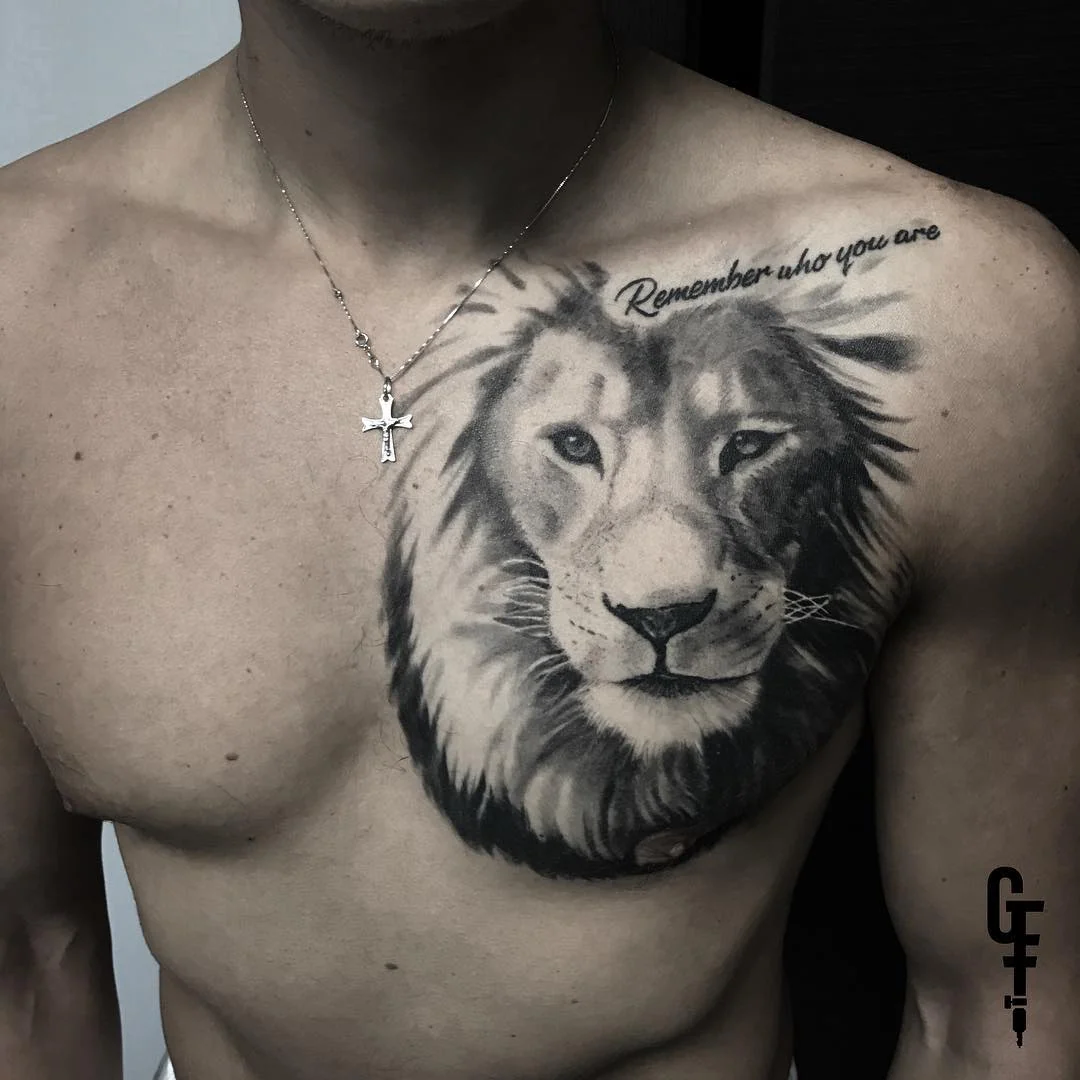 Healed black and grey lion on the chest