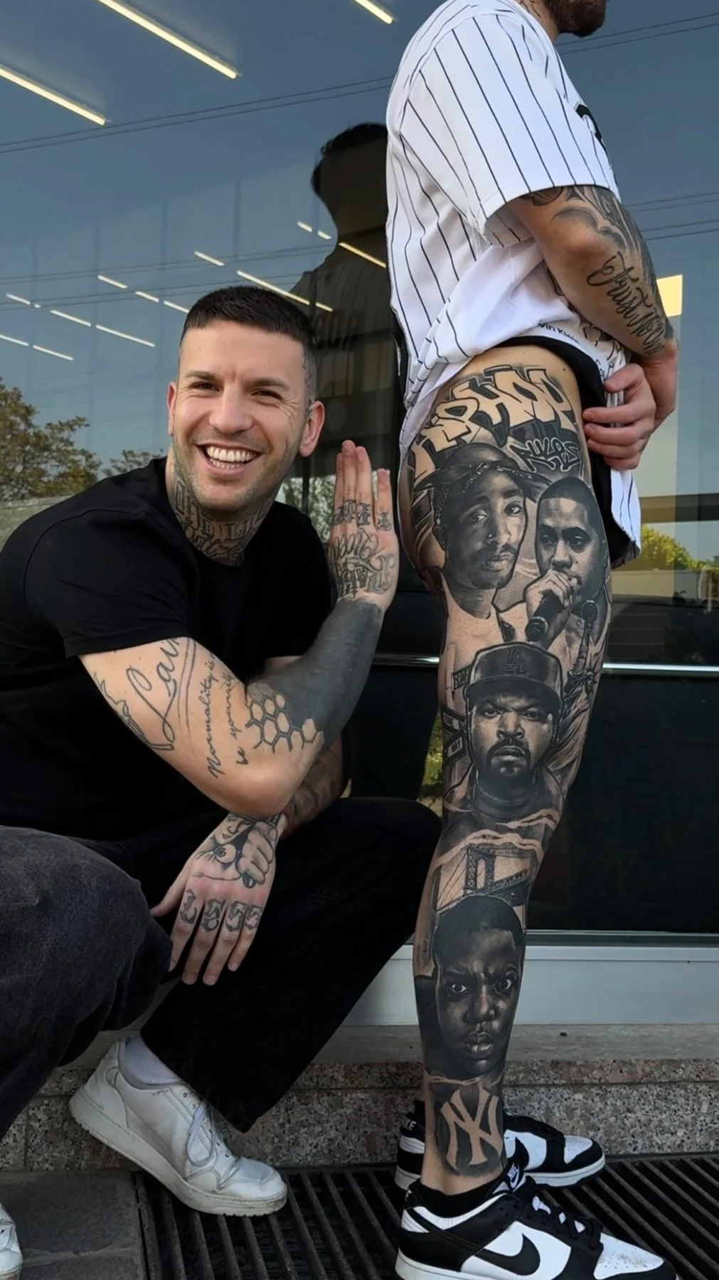 Healed black and grey hip hop leg sleeve photographed in daylight with no filter