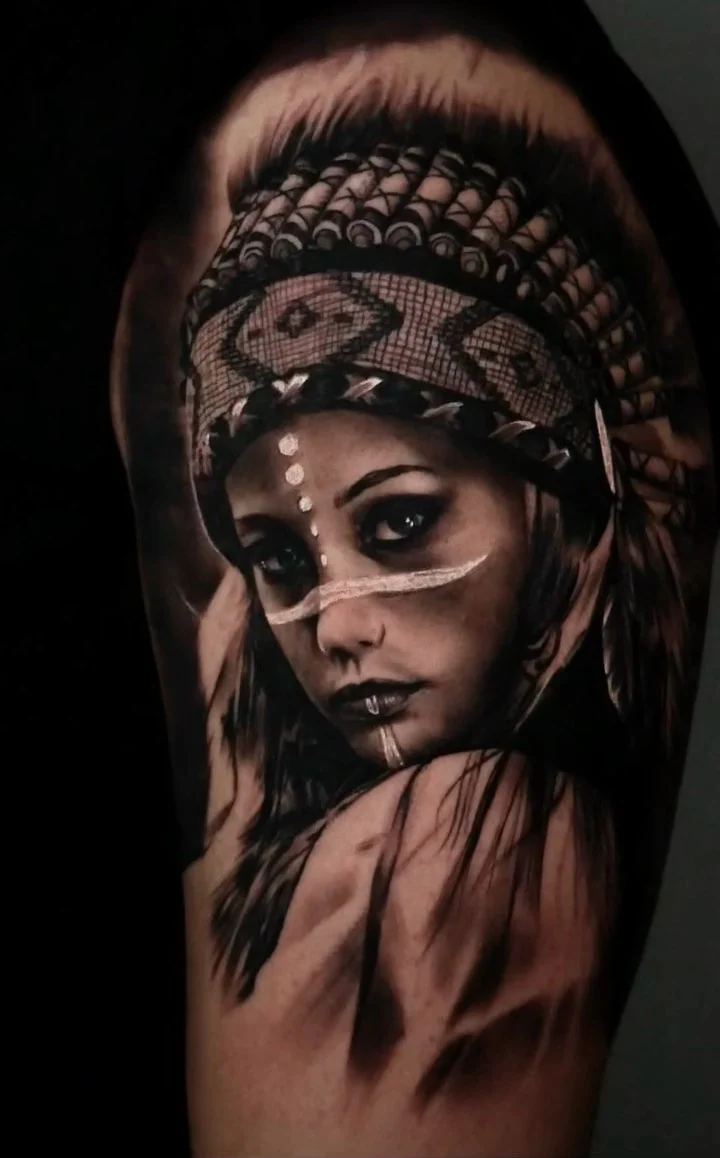 Black and grey portrait of a Native American woman with a feather headdress
